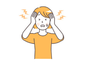 頭が痛い女性