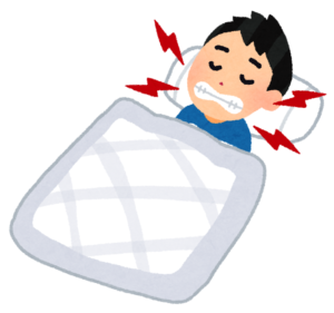 歯ぎしりをする男性
